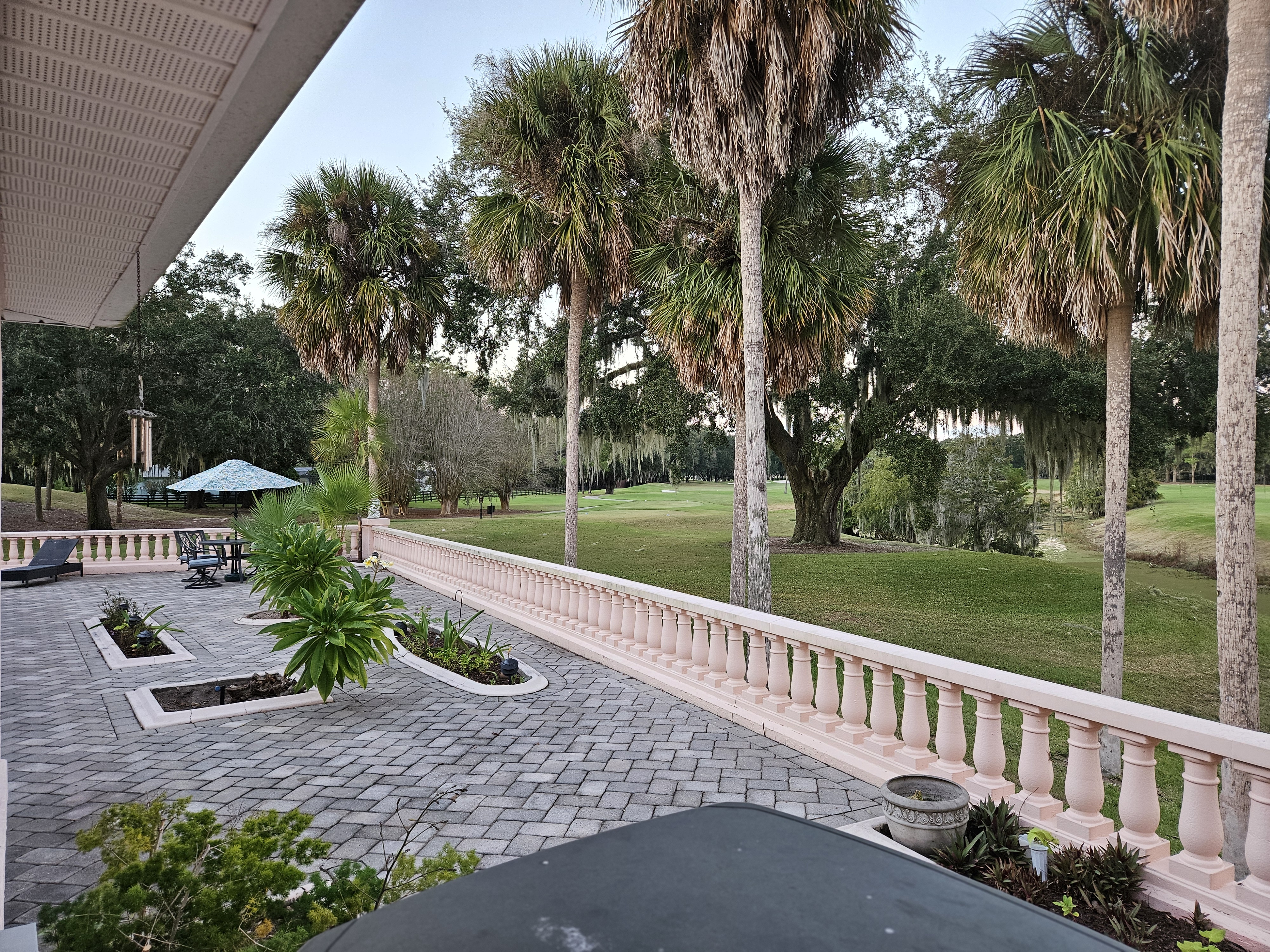 Beautifull exterior of the villa showing Golf Course and Landscaping.